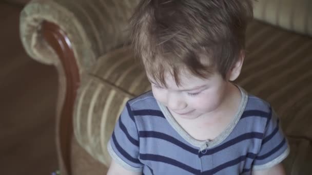 Boy catches a soap bubble - Filmati, video