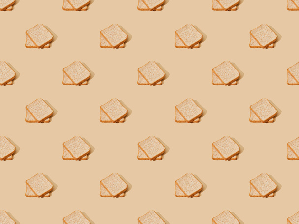 fresh toast bread on beige background, seamless pattern - Photo, Image