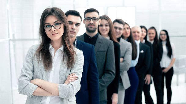 large group of young business people standing in a row. - 写真・画像