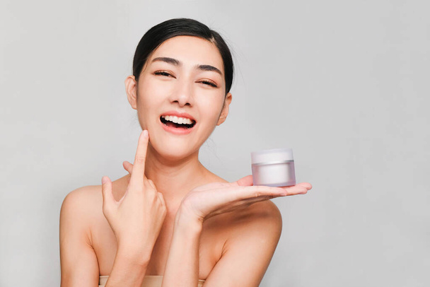 Beauty concept,Young beautiful asian woman with clean and bright skin, Holding Cream jar ,Nourishing cream products - Photo, Image