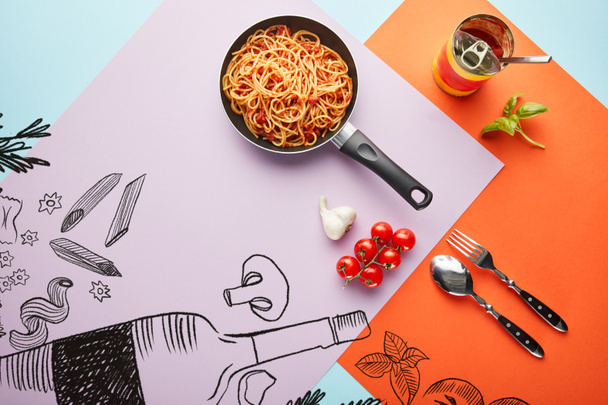 flat lay with delicious spaghetti with tomato sauce in frying pan near ingredients on red, blue and violet background with vegetables and wine illustration - Photo, Image