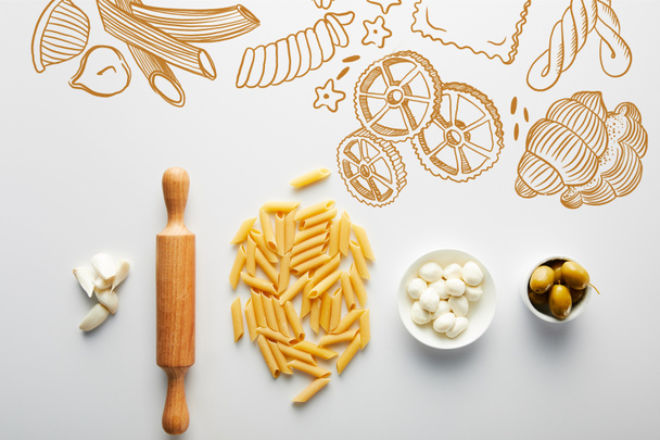 Flat lay with garlic, rolling pin, pasta and bowls with olives and mozzarella on white background, food illustration - Foto, imagen