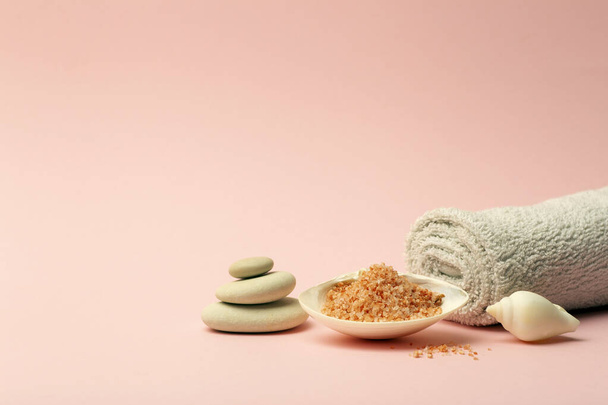 Saved the background. Pink background for spa and bath with a flyer, aromatic salt. Relaxation, massage and body care concept - Фото, изображение