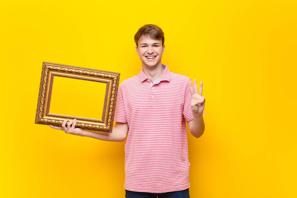 young blonde man with a baroque frame - Foto, imagen