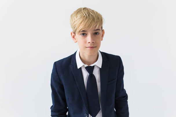 Puberty concept - Teenage boy portrait on a white background. - Photo, Image
