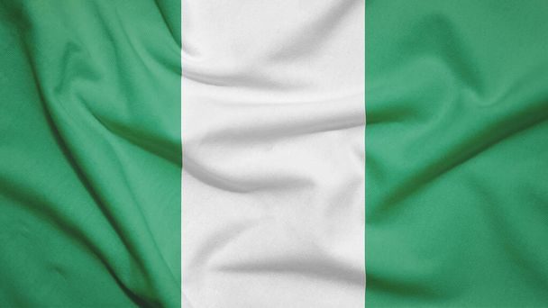 Nigeria flag on the fabric texture - Photo, Image