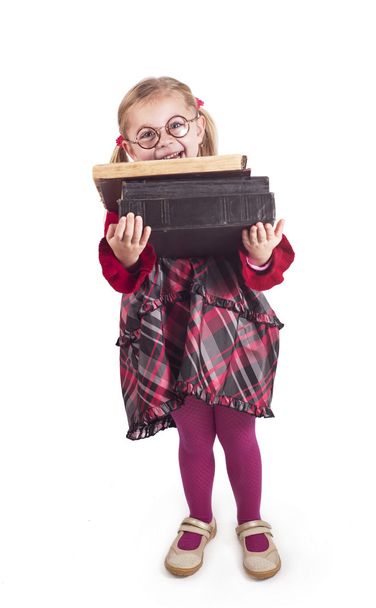 menina segurando livros
 - Foto, Imagem