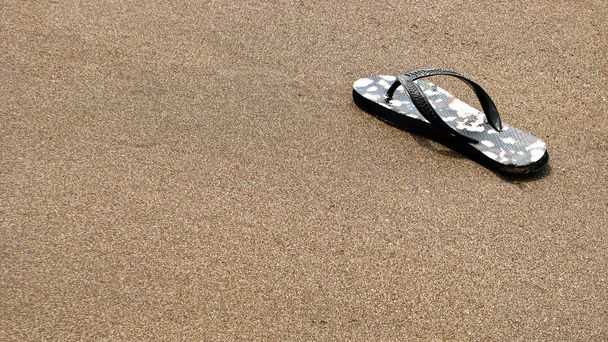 Lost Pair of Flip Flops Sandals on Sandy Beach - Photo, Image
