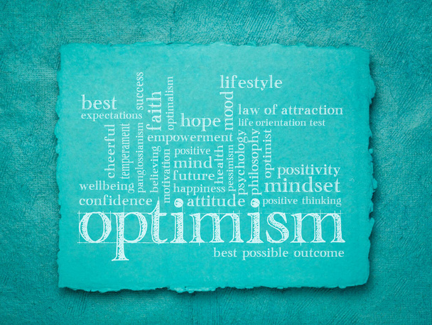 nuvem de palavras otimismo - caligrafia em um papel de pano feito à mão azul, estilo de vida, esperança e conceito de positividade
 - Foto, Imagem