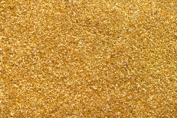 Close up ritagliato piatto lay flatlay immagine foto immagine di lamina oro glitter texture sfondo
 - Foto, immagini