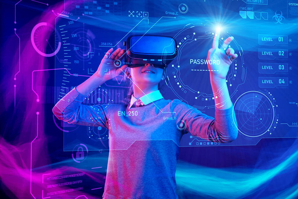 Woman with glasses of virtual reality. Future technology concept. Colorful neon lights. - Foto, immagini