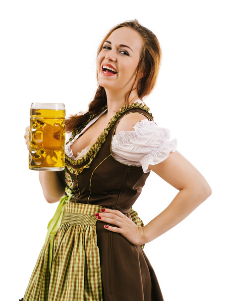 Happy woman drinking beer during Oktoberfest - Фото, изображение