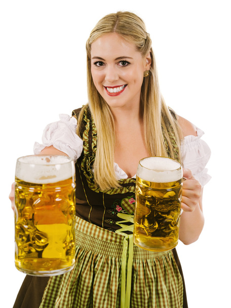 Happy blond serving beer during Oktoberfest - Фото, изображение