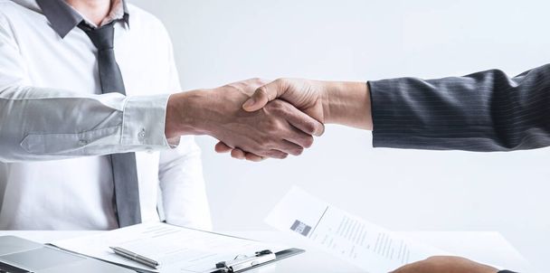 Successful job interview, Boss employer in suit and new employee shaking hands after negotiation and interview, career and placement concept. - Photo, Image