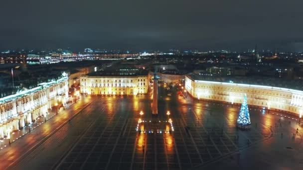 Aerial view to Palace square with Winter Palace and Alexander Column in background, St Petersburg, Russia - Materiał filmowy, wideo