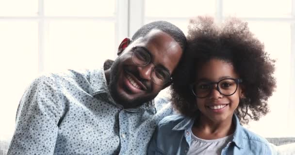 Portrait of smiling two generations family nerds in eyeglasses. - Video, Çekim
