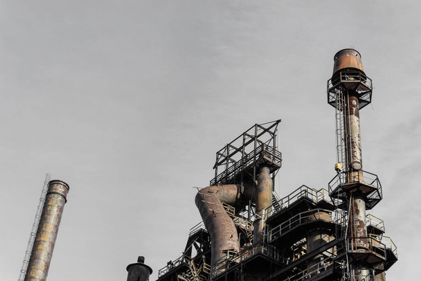 Pennsylvania steel mill industrial complex against gray sky, horizontal aspect - Photo, Image