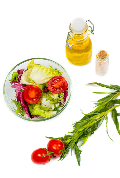 Fresh spring vegetables, salad, spices on a white background - Photo, Image
