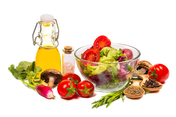 Fresh spring vegetables, salad, spices on a white background - Zdjęcie, obraz