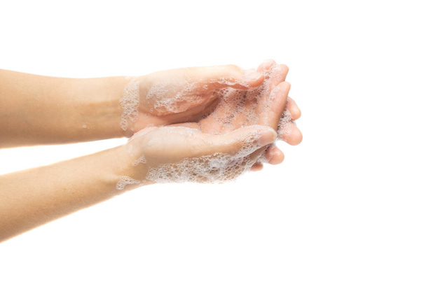 Mycie rąk saopą na białym tle w koncepcji higieny - Zdjęcie, obraz