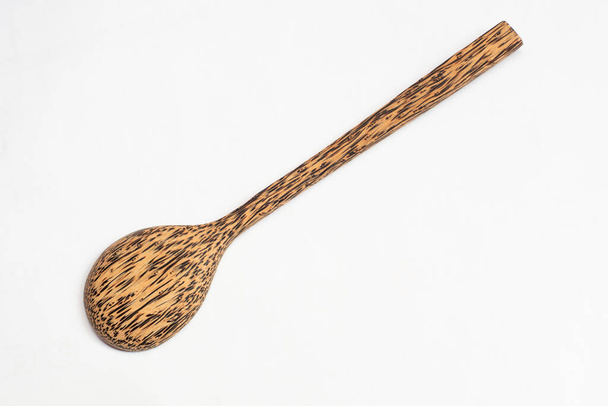 Closr up spoon wood on white background. - Photo, Image