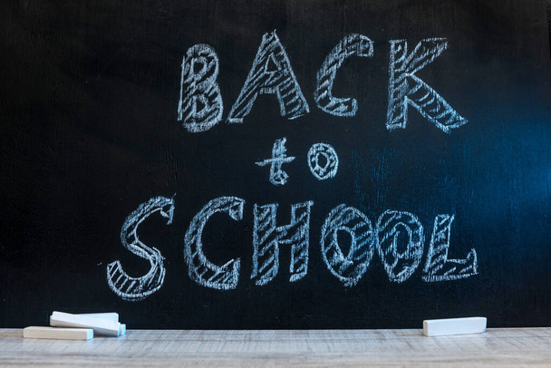 School blackboard with text 'Back to school' . September and education concept - Фото, зображення