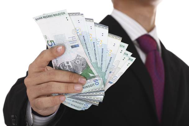 Businessman showing money - Valokuva, kuva
