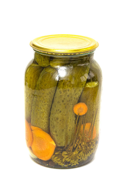 Glass jar, pickles with cucumbers, white background. - Photo, Image