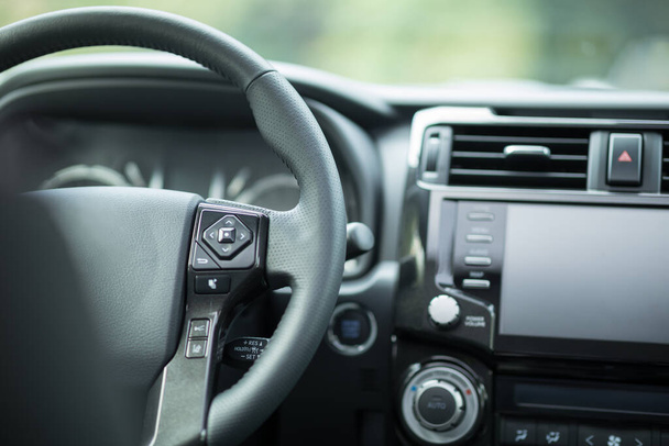 Black steering wheel in luxury car  - Zdjęcie, obraz