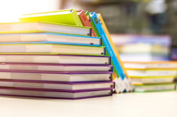 stack of books in library at school, university, college. - 写真・画像