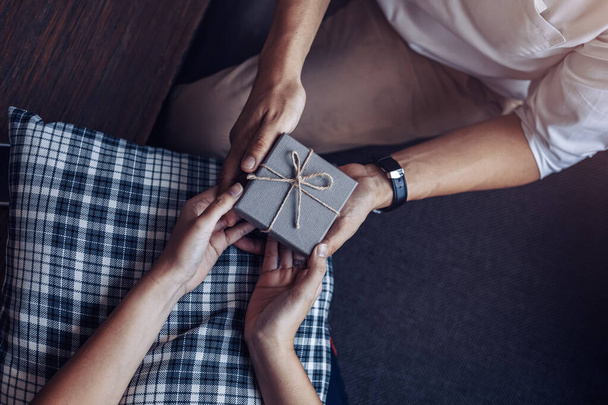 christmas, valentine, holidays gift box concept. Couple surprise gift box together. - 写真・画像