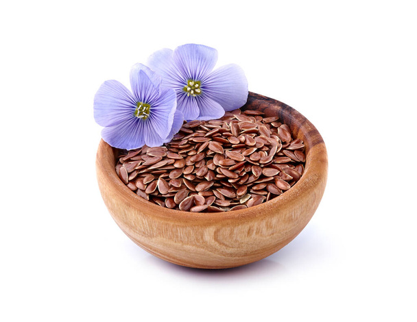 Flax seeds in wooden bowl on white background - Photo, Image