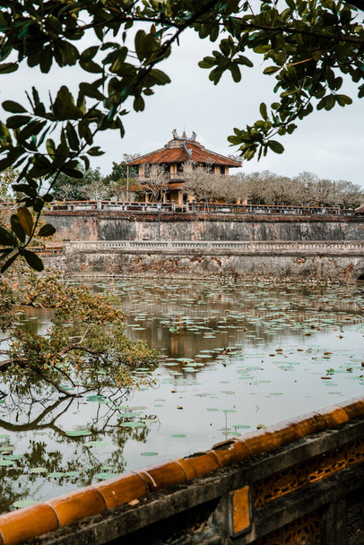 Hue, Vietnam  27 July 2019: Temple in the Imperial City (citadel) of Hue (UNESCO World Heritage site). The place that leads to the palaces of kings, is the official in the 19th century in Hue, Vietnam - Photo, Image