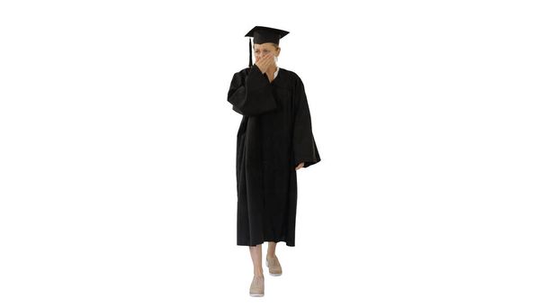 Young graduate woman sick and coughing while walking on white background. - Foto, immagini