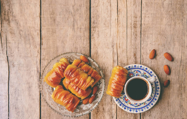 A cup of Turkish coffee and baklava. Selective focus. Drink. - 写真・画像