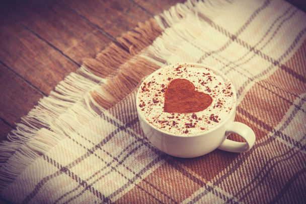 Чашка кофе и шарф
. - Фото, изображение