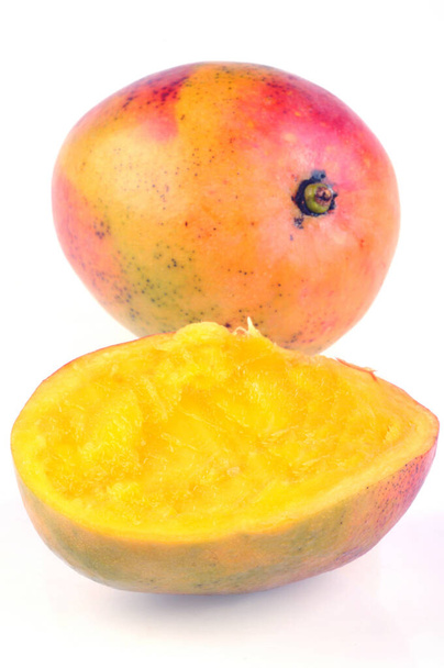 Ripe mangoes cut close-up on white background  - Photo, Image