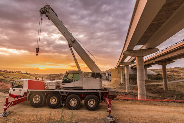 Mobile crane building a highway bridge - Photo, Image