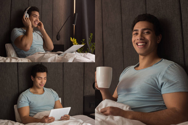 collage con sonriente hombre de raza mixta sosteniendo una taza de café, usando una tableta digital y escuchando música con auriculares y computadora portátil en la cama durante el autoaislamiento
 - Foto, imagen