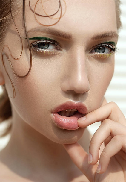 beautiful sexy wet girl portrait with colorful makeup in the summer is hot - Foto, Imagem