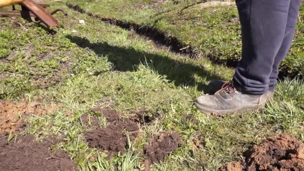 digging holes for fence posts. pile foundation. - Video, Çekim