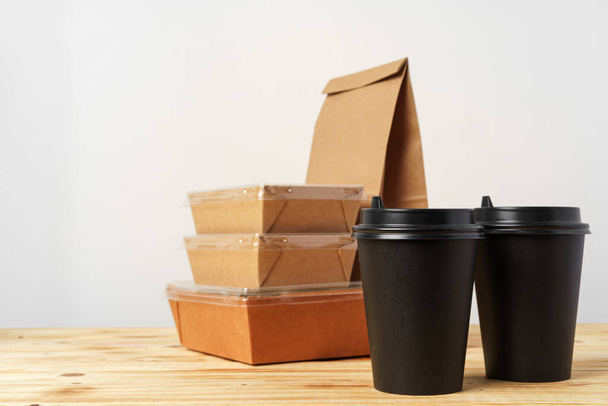 Paper bags with take away food and coffee cups containers - Foto, Imagen