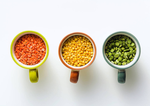 lentils of different types and colors in portioned cups. vegan proteins. - Fotografie, Obrázek
