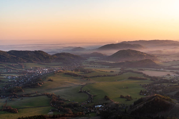 sunrise in the valley of a beautiful green field in spring with fog, Czech Beskydy Frenstat pod Radhostem - Foto, Imagem