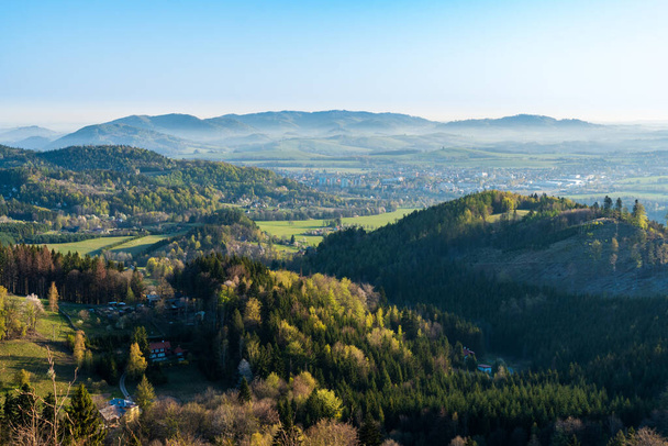 beautiful valley with village and fog in spring morning, Beskydy mountains - Fotoğraf, Görsel