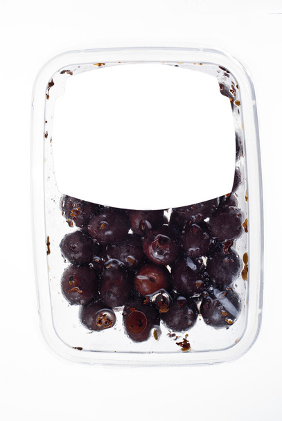 Oliven in Kunststoffbox Oberfläche - Foto, Bild