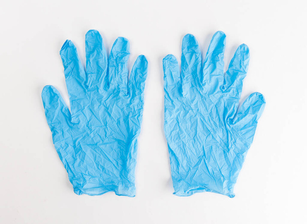 Blue medical gloves isolated on white background - Photo, image