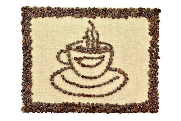 Μια φωτογραφία με κόκκους καφέ. Σύνθεση καφέ. Ένα φλιτζάνι καφέ και κόκκους καφέ.. - Φωτογραφία, εικόνα