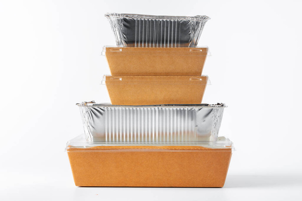 Assortment of food delivery containers on white background - Foto, afbeelding
