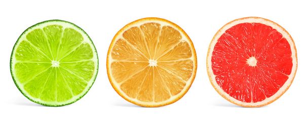 Set of different citrus slices on white background, top view - Fotó, kép